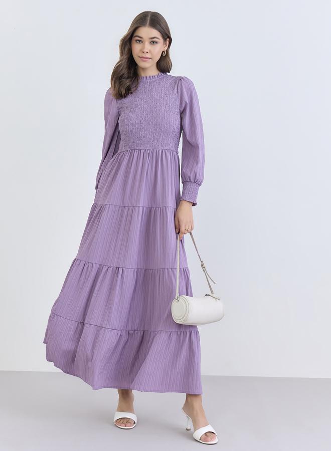 ستايلي فستان طويل بطبقات وتفاصيل مزمومة - Image 1